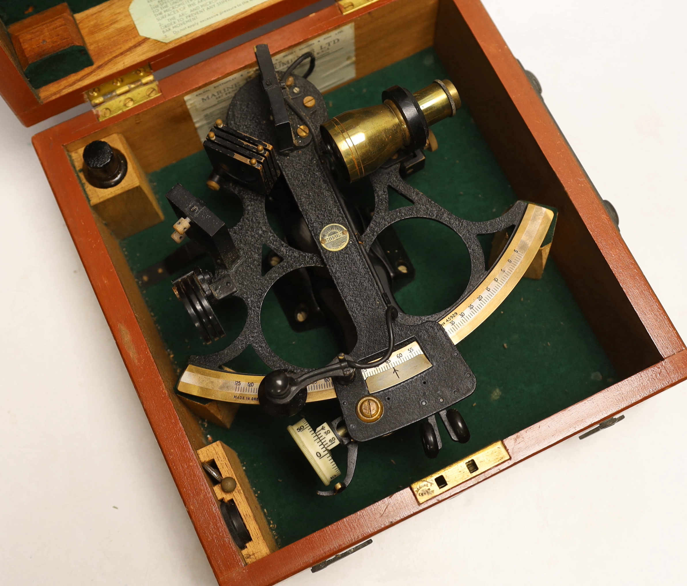 A cased mid-20th century Husun sextant in a fitted case, manufacturer inspection certificate label dated 7/11/45 inside lid, 27.5 x 26.5 x 14cm